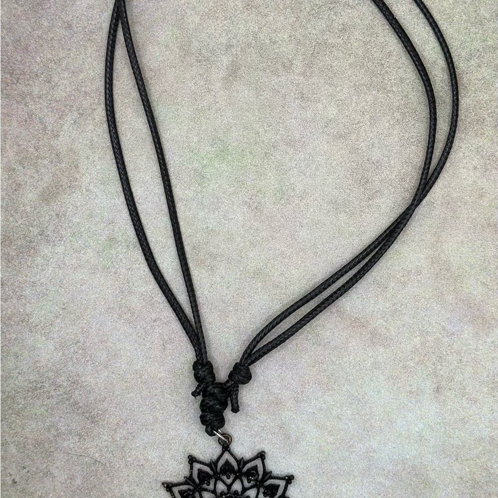 Black Filigree Sunburst Pendant Necklace - Women's Jewelry - Picture 4 of 5